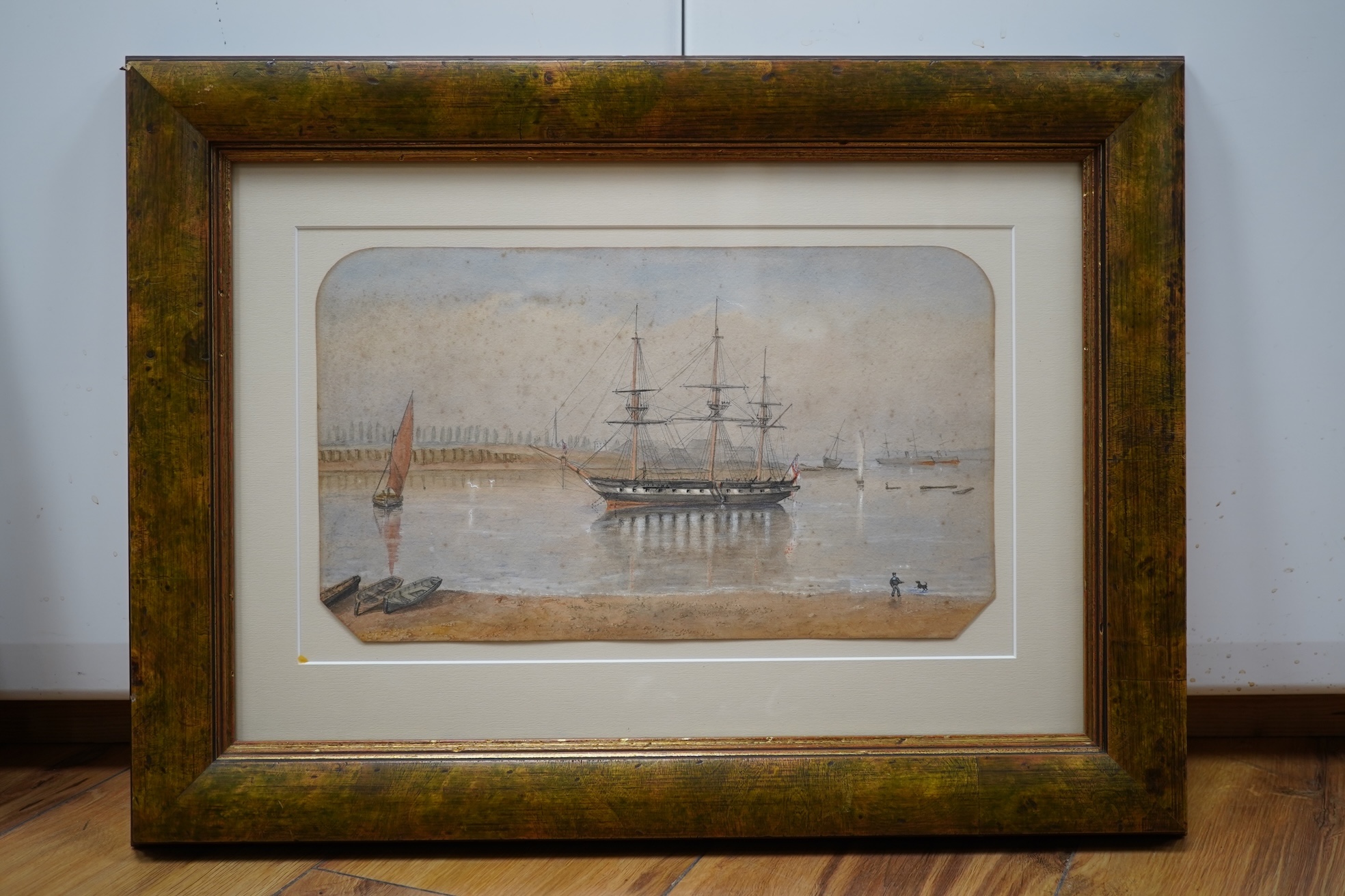 Mid Victorian School, Three-masted British ship in an estuary, maritime interest watercolour on card, 18 x 31cm
